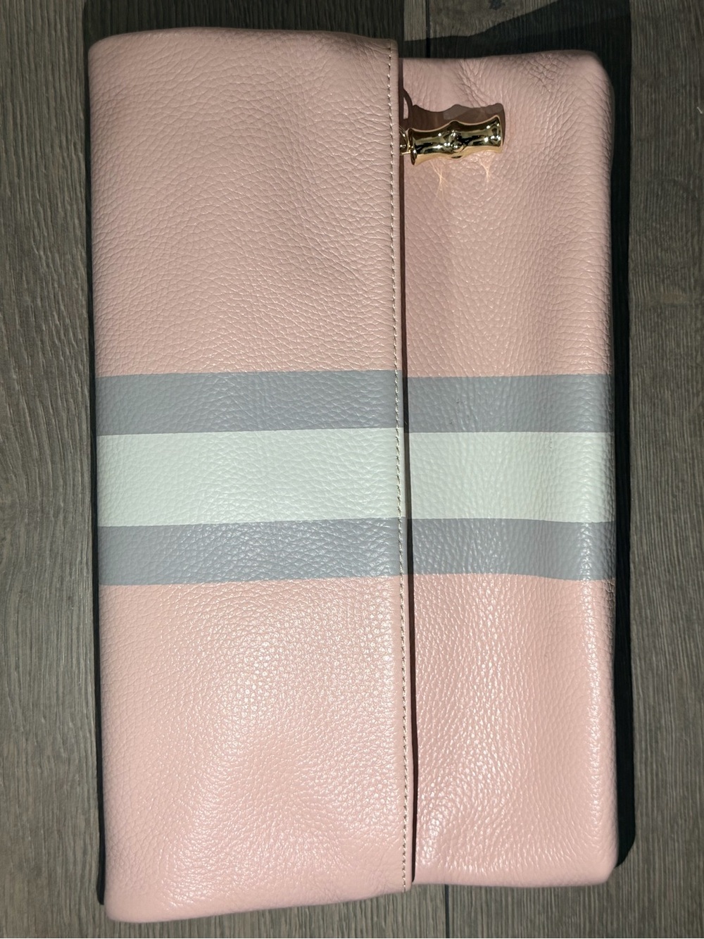 Elegant Pink Striped Wristlet Clutch with Gold Accent
